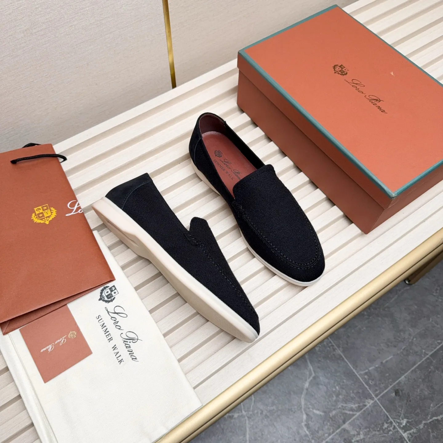 Men's Men's Shoes 💰400 Loro PIana moccasins are made of wish wool fabric. The upper is made of knitted fabric, made on a loom, and then attached to a rubber sole. The Rain System's water-repellent treatment enhances the shoe's functional design, while the suede details give the shoe a sense of elegance and sophistication. Made from Wish, fine wool from Australian and New Zealand Merino sheep